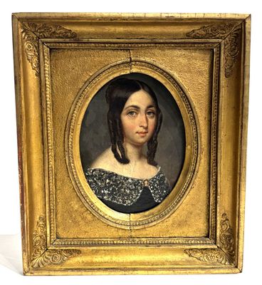 portrait of a woman in a black dress in a gold frame