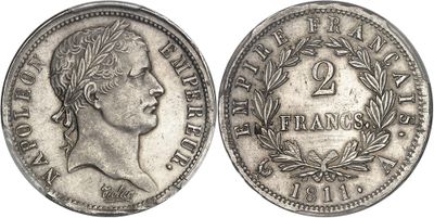 gros plan d'une pièce de monnaie sur fond blanc