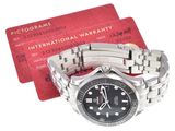 a watch that is sitting next to a red card