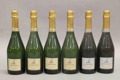 six bouteilles de champagne sont alignées