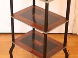an image of a three tiered table with a wooden top