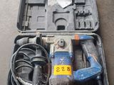 a tool in a case that is sitting on the floor