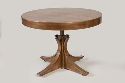 une image d'une table ronde avec un plateau en bois