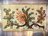 a picture of a table runner with birds and flowers on it