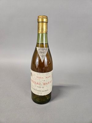 a bottle of wine that is sitting on a table