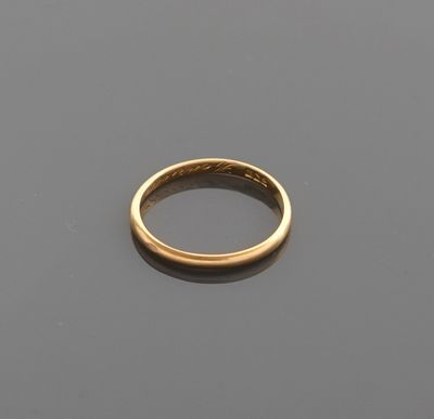 Alliance en or jaune 18K 750 millièmes.