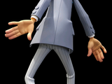 a figurine of a man dressed in a suit and tie