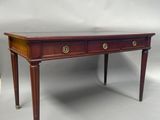 une image représentant une table avec deux tiroirs et un tiroir en dessous
