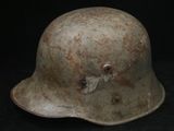 an old helmet on a black background with a black background