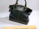 louis vuitton black leather handbag with yellow trim and gold hardware