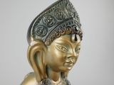 a statue of a woman with a crown on her head