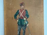 une vieille photo d'un soldat en uniforme, avec une épée