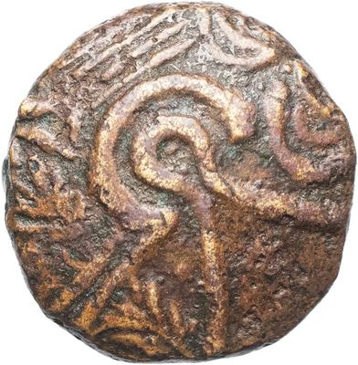 un gros plan d'une pièce de monnaie ornée d'un motif en spirale