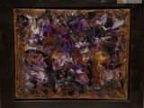 abstract painting of purple and brown colors in a black frame