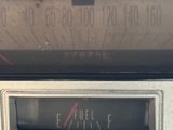 a close up of an old radio with the time on it