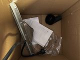 a cardboard box with a computer inside of it