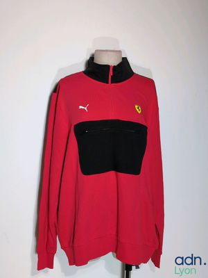 a close up of a red sweatshirt on a mannequin mannequin