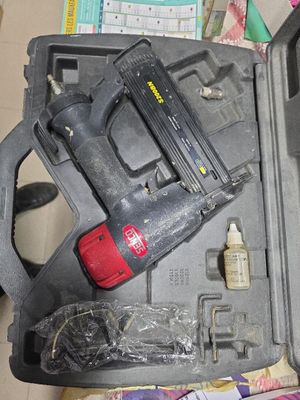 a tool that is sitting in a case on the floor