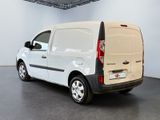 a white van that is parked in a room