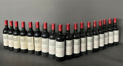 a group of bottles of wine sitting on top of a table