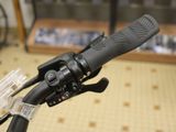 a close up of a bicycle handlebar with a camera attached to it