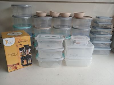 a lot of plastic containers sitting on a counter