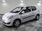 a picture of a small white car on a checkered floor