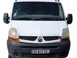a white van that is parked on the side of the road