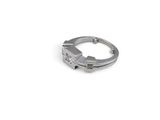a silver ring with a star on it