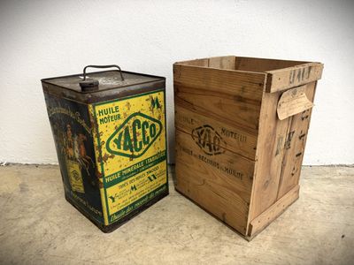 a wooden box next to a wooden box on the floor