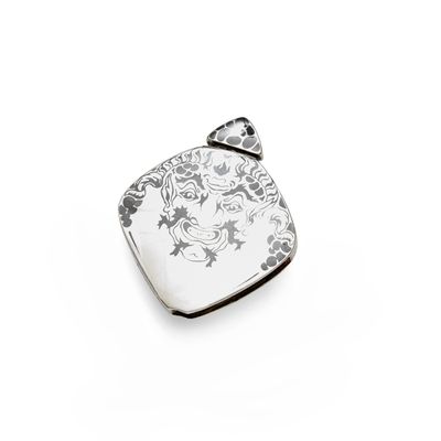 a small silver box with a floral design on it
