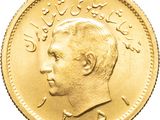 gros plan d'une pièce d'or avec le visage d'un homme
