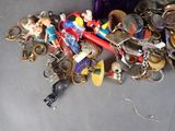 a pile of assorted key chains and other items
