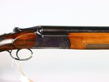 a close up of a shotgun on a white background