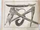 a drawing of a knife and a pair of shoes on a table