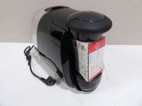 an image of a coffee maker on a white table