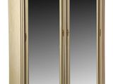 an image of a wooden armoire with two mirrors on top of it