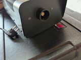 an open tool box with a power strip attached to the side of it