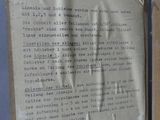 a piece of paper on the door of a building
