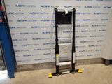a close up of a ladder in front of a wall