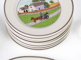 several plates with a picture of a horse drawn on them