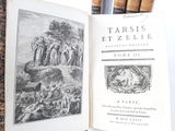 an open book with a picture of a group of people on it