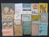 many old children ' s books on display on a table