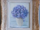 a painting of a vase with purple flowers in it