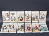 six cards with pictures of people and animals on them on a black surface