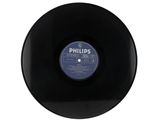 a black vinyl record with a label on the side of it