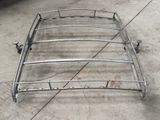 an image of a metal bed frame on a concrete floor