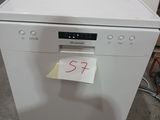 a white dishwasher with a sticker on it