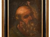 portrait of an old man with a beard in a gold frame