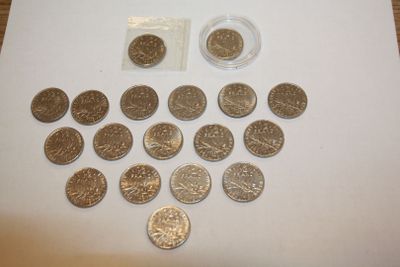 a lot of coins that are on the table